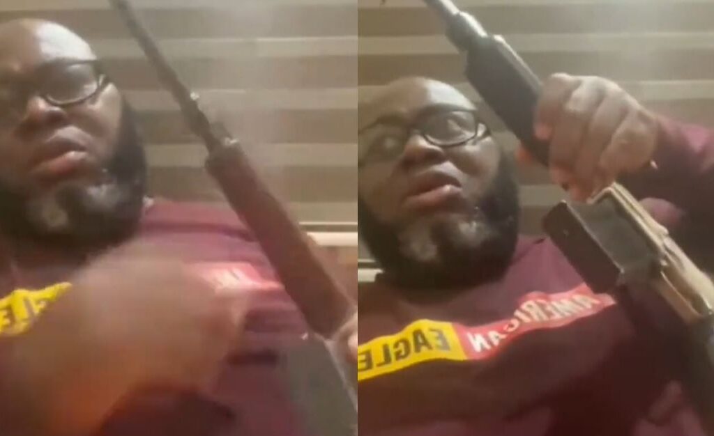 ASARI DOKUBO WITH AK47