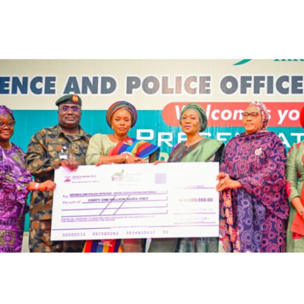 First Lady presents cheques to wives of fallen heroes