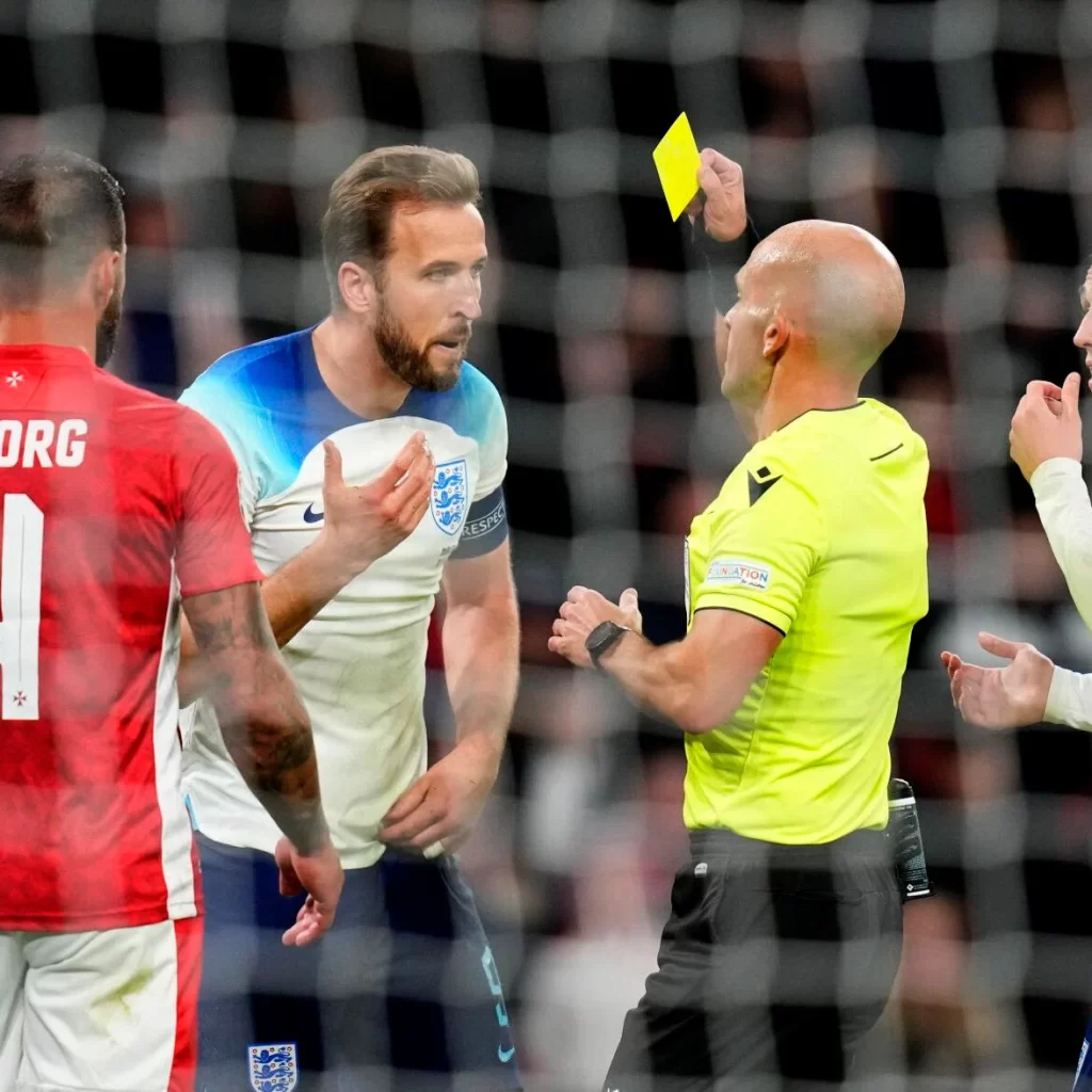 Referee Luis Godinho under fire for giving Harry Kane yellow card