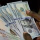 Naira returns to depreciation against dollar at official foreign exchange market